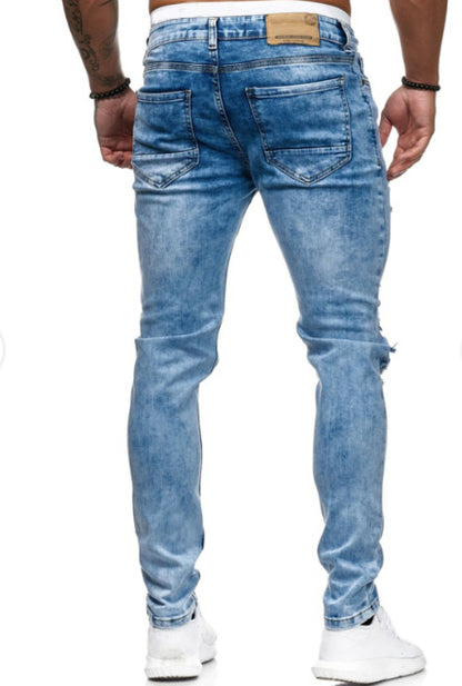 Shredded stretch-straight denim trousers