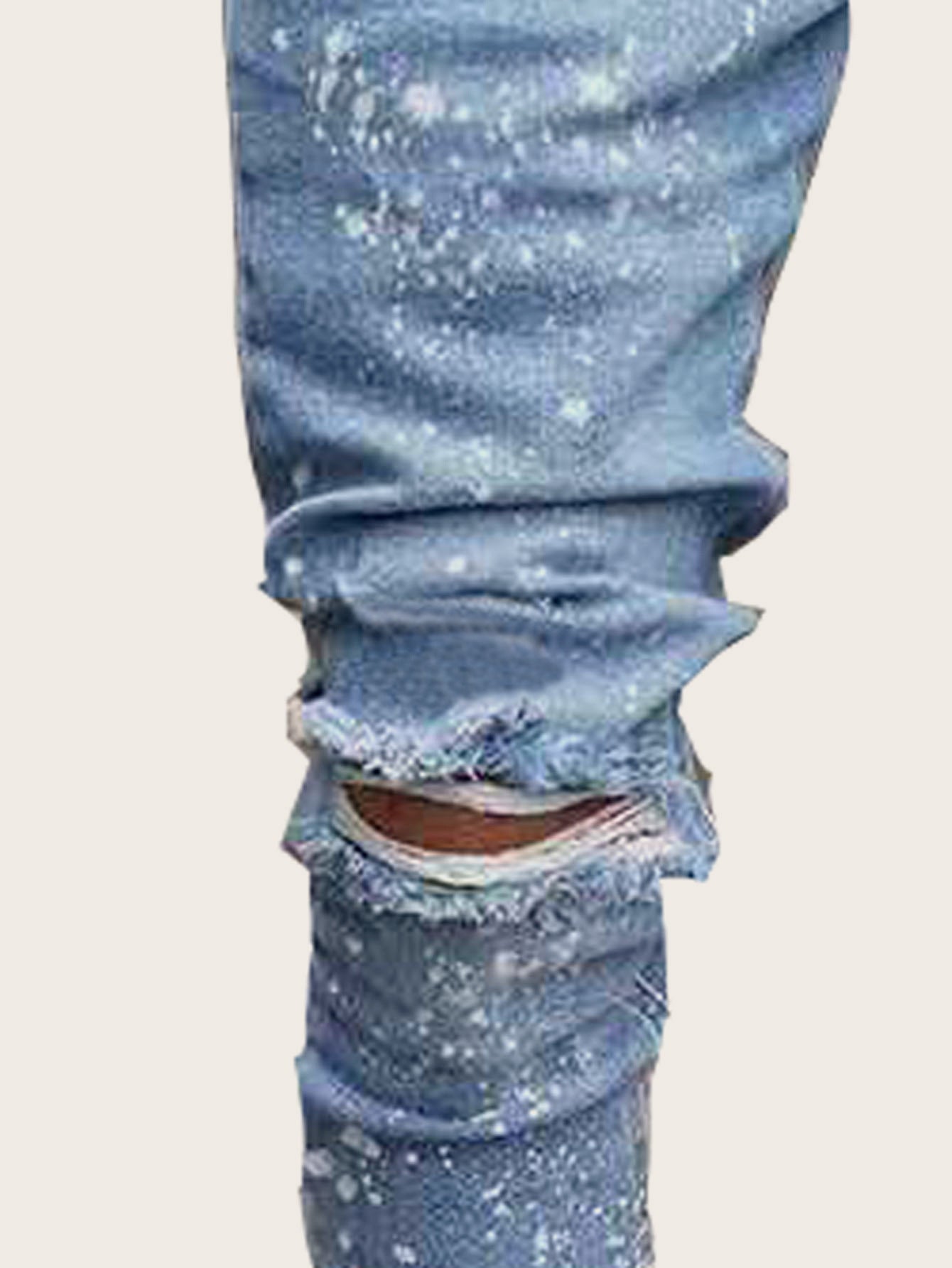 Washed jeans with small zipper holes