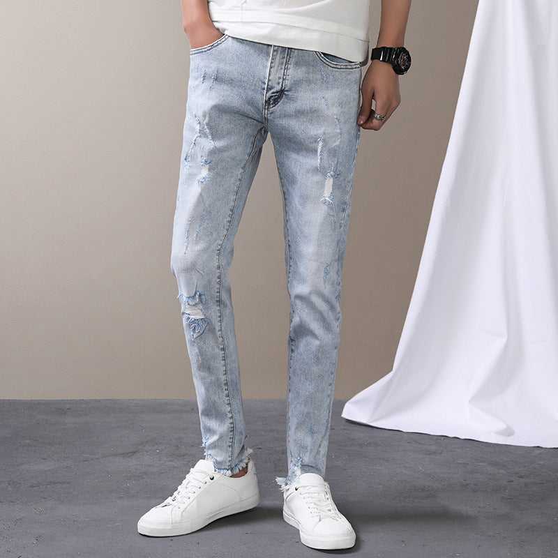 Light-colored hole high-end stretch jeans