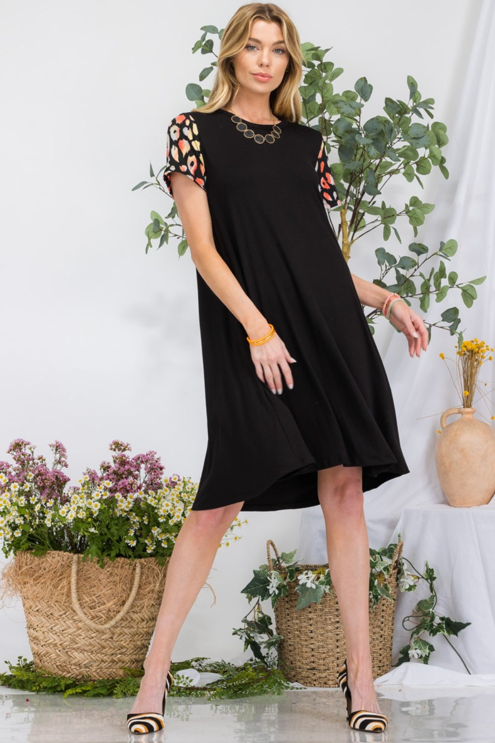 Celeste Full Size Leopard Short Sleeve Dress with Pockets 