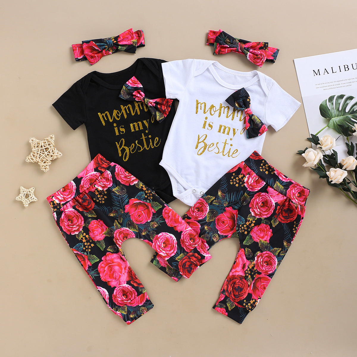 White Printed Baby Suit with Pink and Black Floral Bottoms 