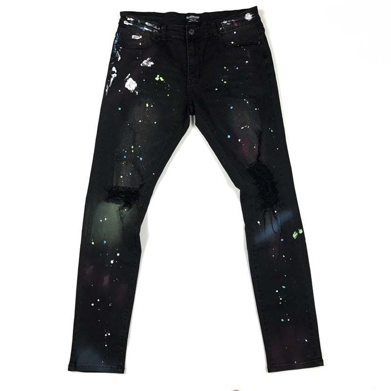 Splashed graffiti ripped stretch-leg jeans