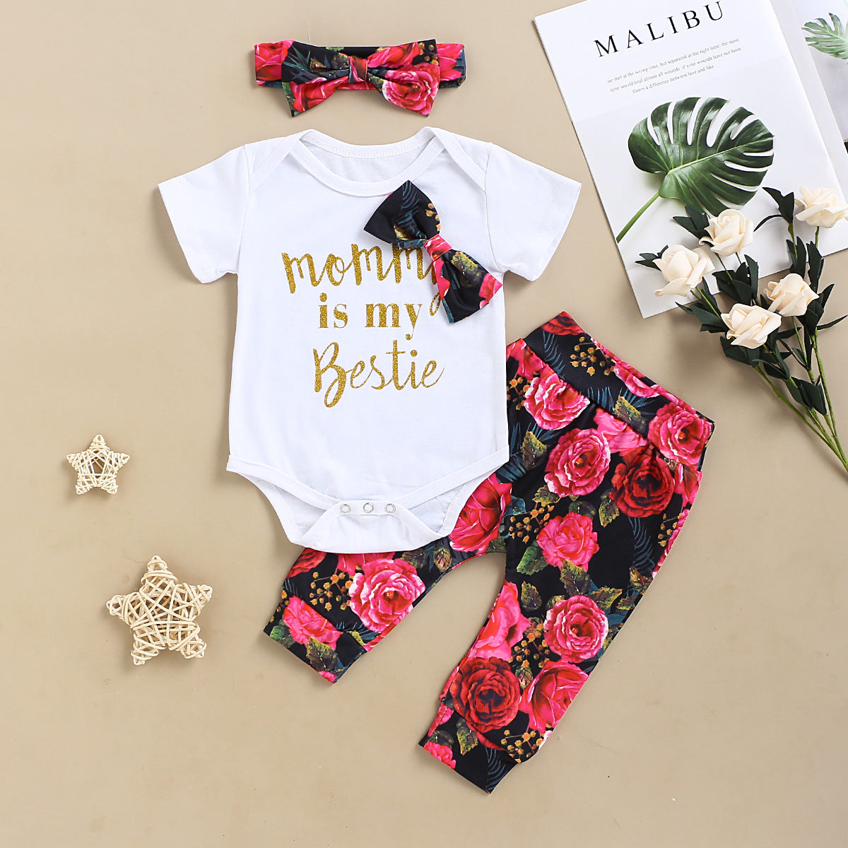 White Printed Baby Suit with Pink and Black Floral Bottoms 