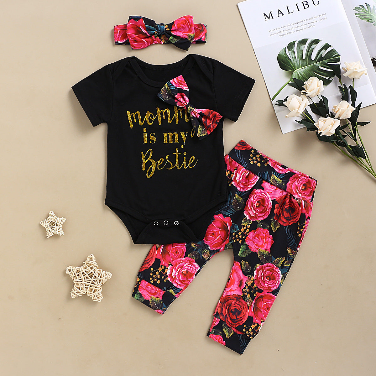 White Printed Baby Suit with Pink and Black Floral Bottoms 