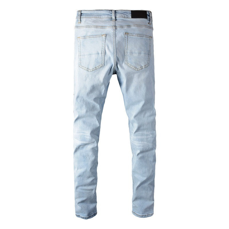 Folded Blue and White Leather Zipper Jeans