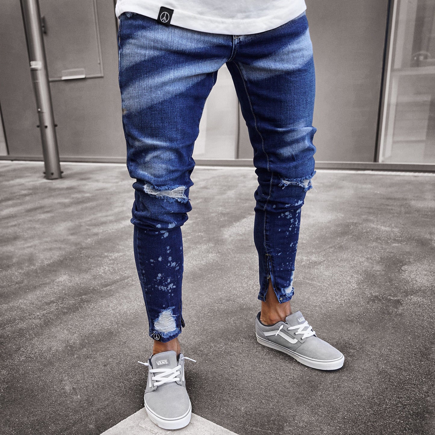 Shredded denim men's feet pants paint zipper personality slim feet jeans