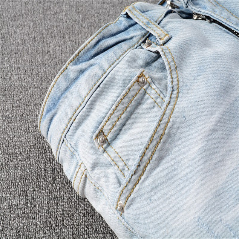 Folded Blue and White Leather Zipper Jeans