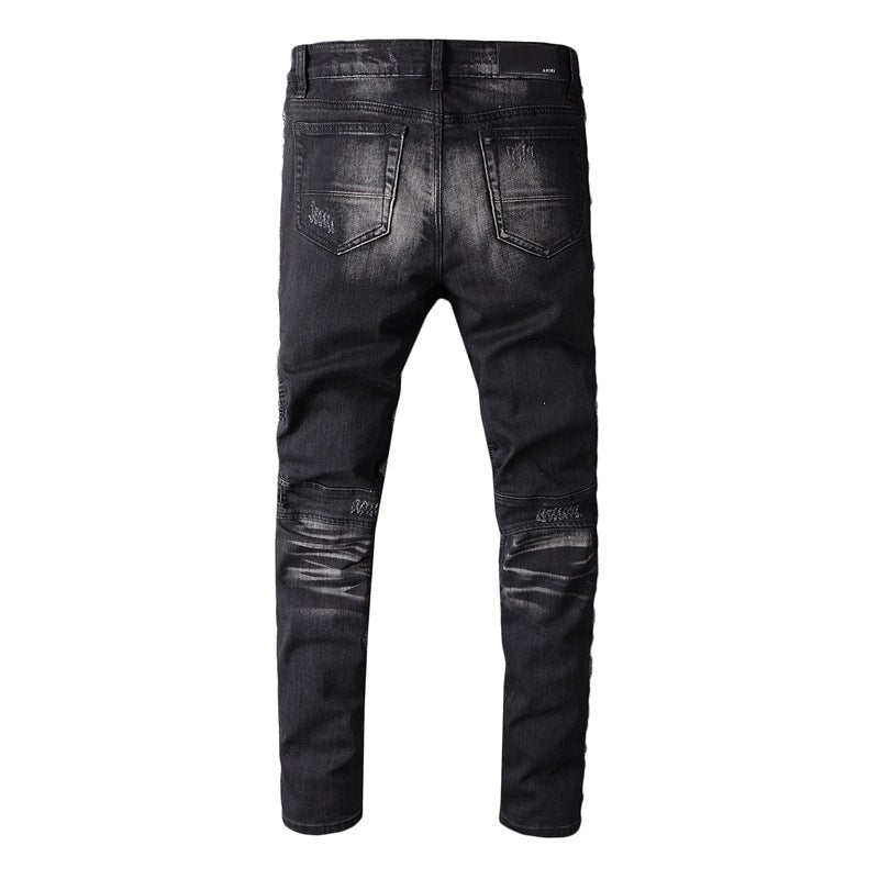 Black slim-leg motorcycle jeans