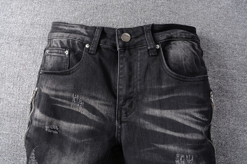 Black slim-leg motorcycle jeans