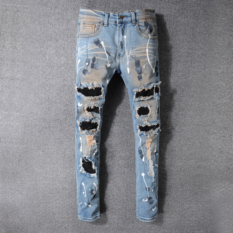 Ripped Men's Jeans Made Of Old Washed Patch