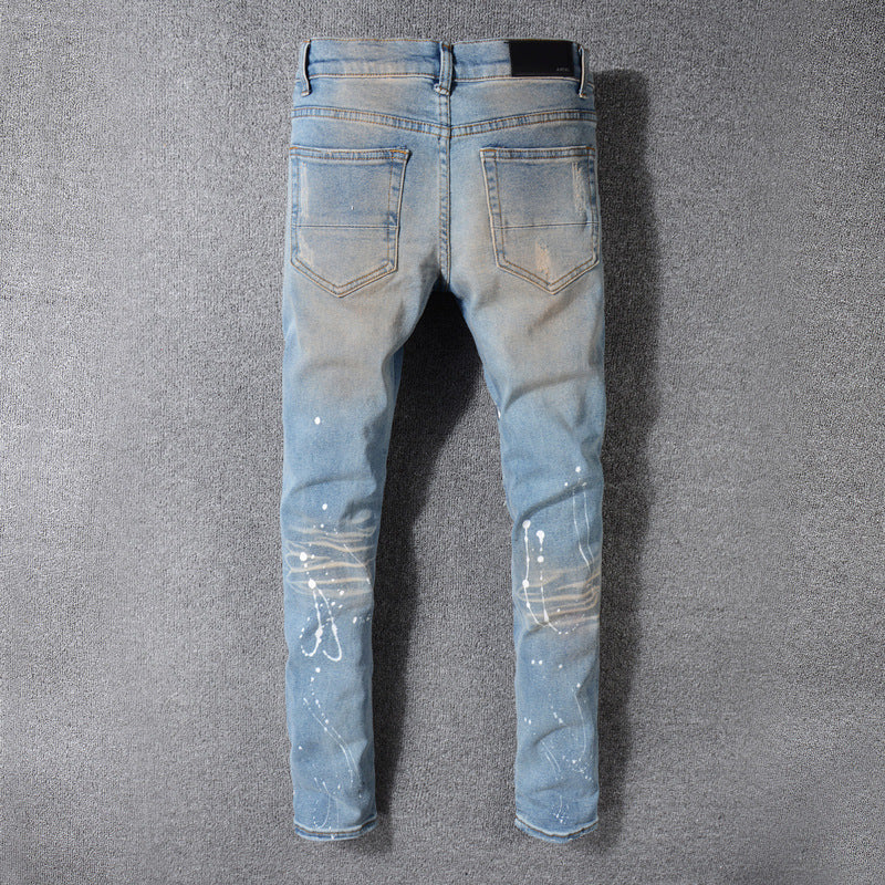 Ripped Men's Jeans Made Of Old Washed Patch