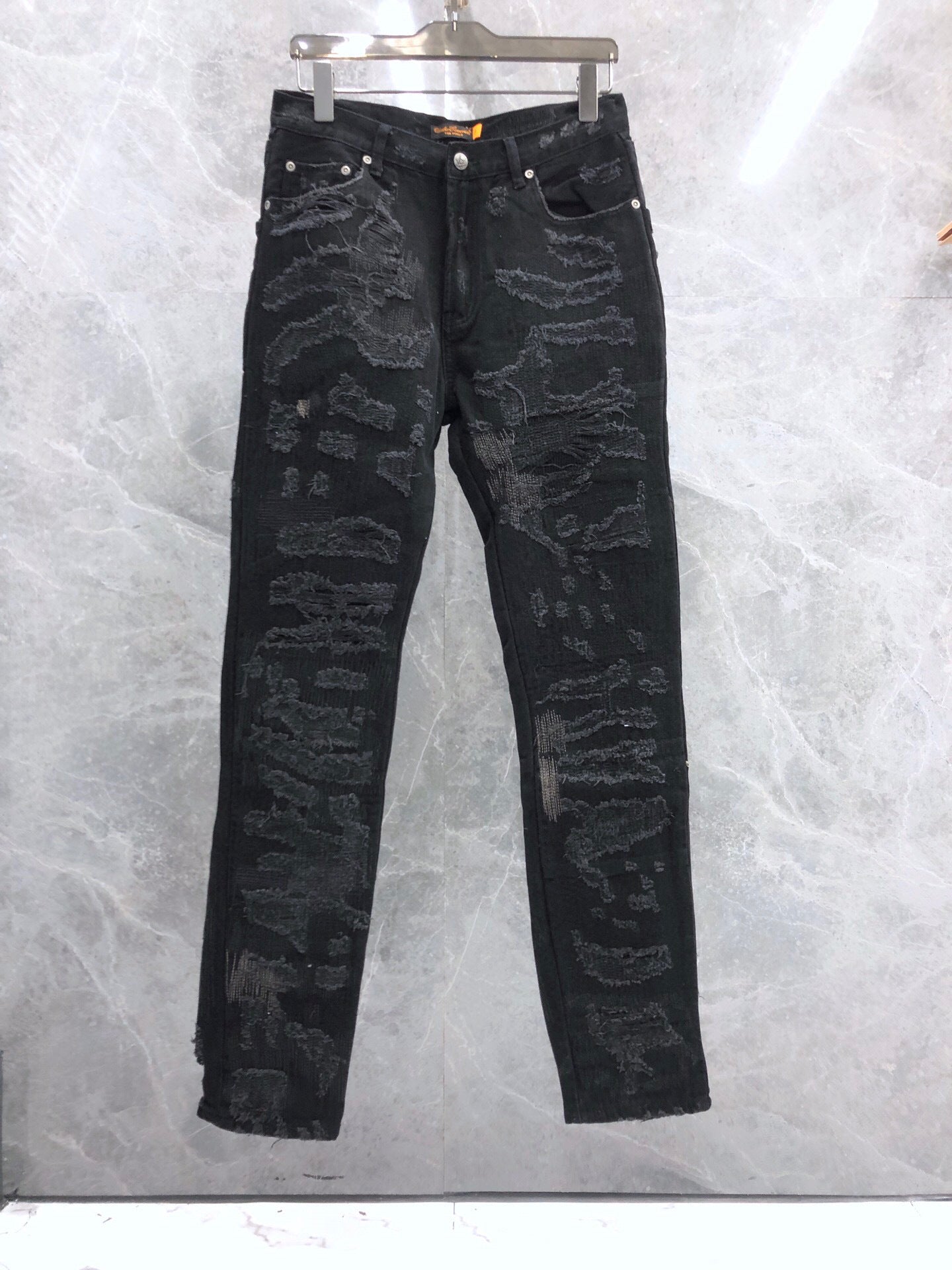 Blue and black cow embroidered jeans