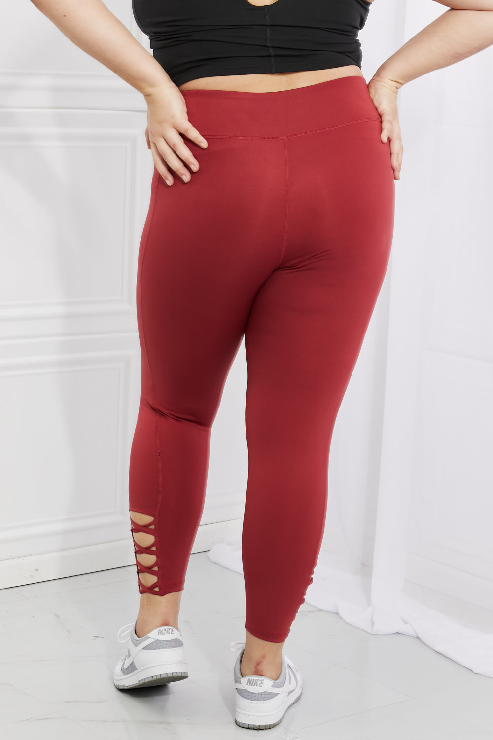 Yelete Ready For Action Full Size Ankle Cutout Active Leggings in Brick Red 