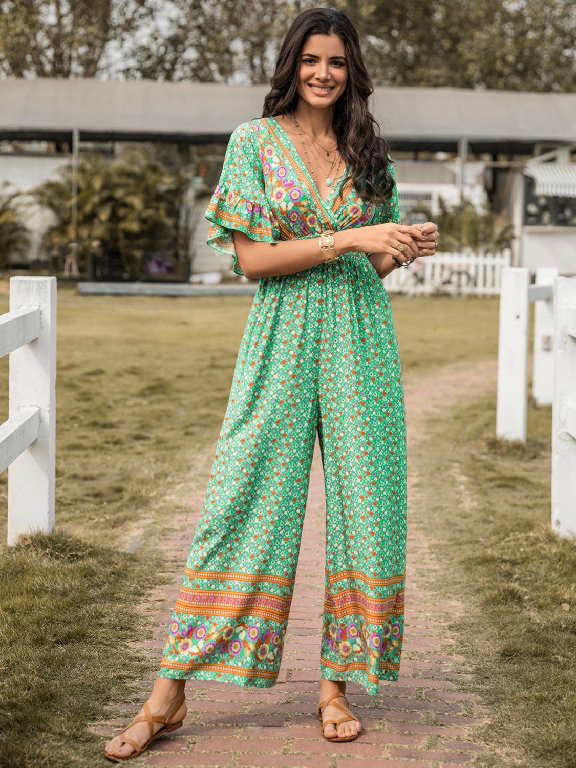 Floral Surplice Flutter Sleeve Jumpsuit 