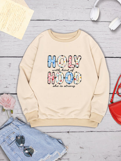 HOLY WITH HINT OF HOOD SHE IS STRONG Round Neck Sweatshirt