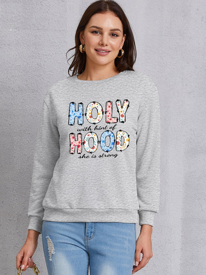 HOLY WITH HINT OF HOOD SHE IS STRONG Round Neck Sweatshirt 