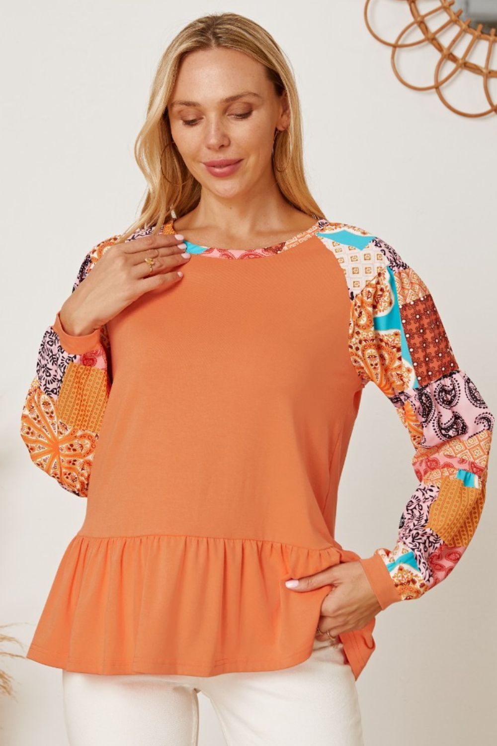 Printed Round Neck Peplum Blouse 