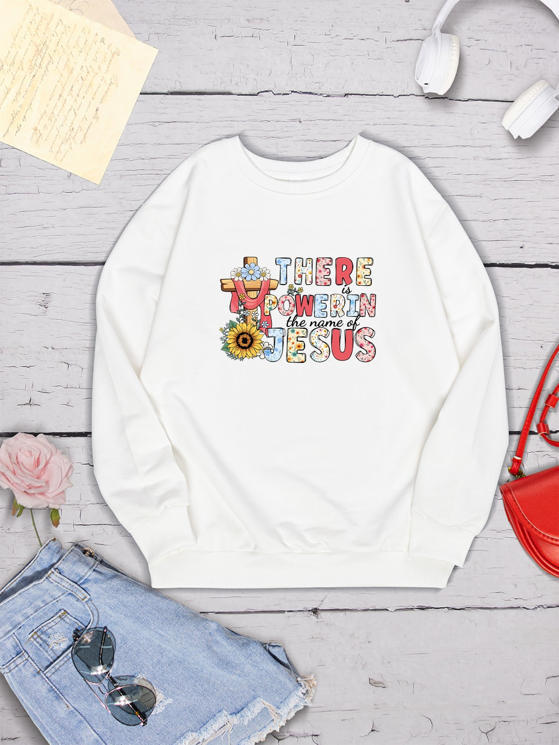 THERE IS POWER IN THE NAME OF JESUS Round Neck Sweatshirt 