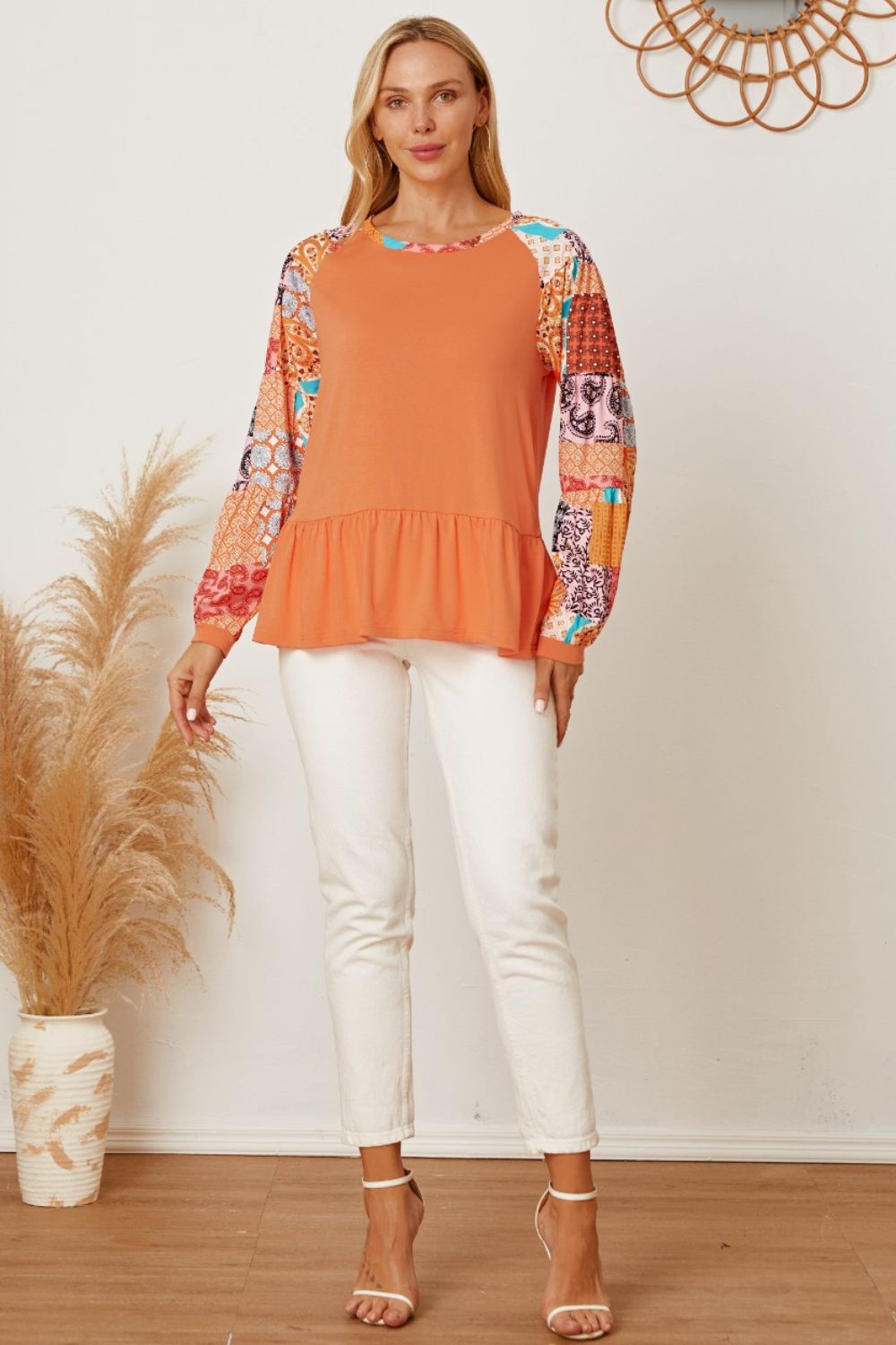 Printed Round Neck Peplum Blouse 