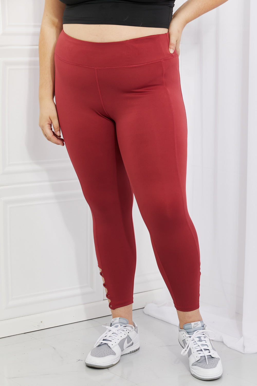 Yelete Ready For Action Full Size Ankle Cutout Active Leggings in Brick Red 